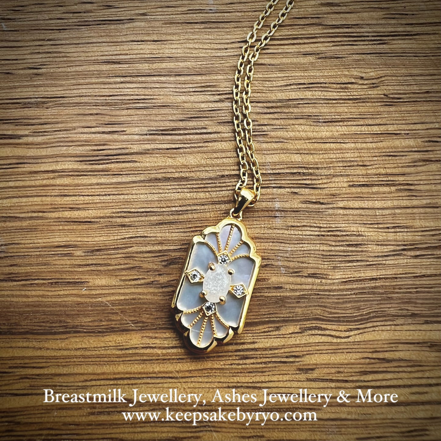 SOLITAIRE: MARIE MOTHER OF PEARL PENDANT WITH OVAL SHAPED SOLITAIRE