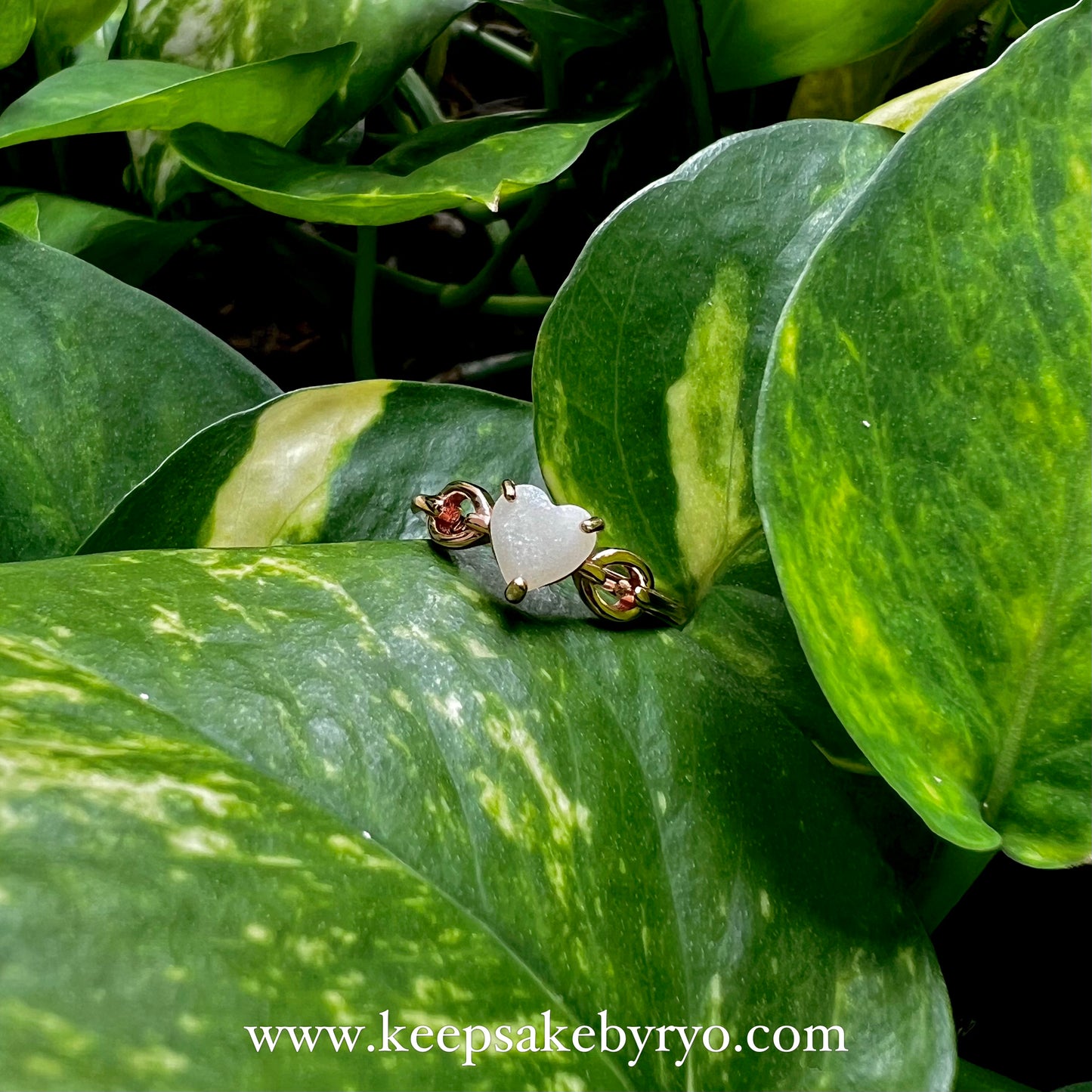 SOLITAIRE: HOPE HEARTLINKS RING WITH HEART SHAPED INCLUSION STONE