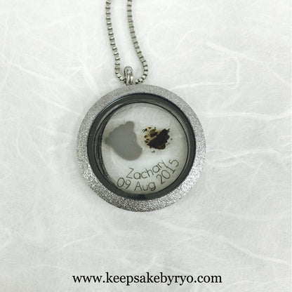 TRIPLE INCLUSION GLASS LOCKET