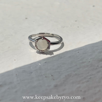 SOLITAIRE: HEXI RING WITH ROUND INCLUSION STONE