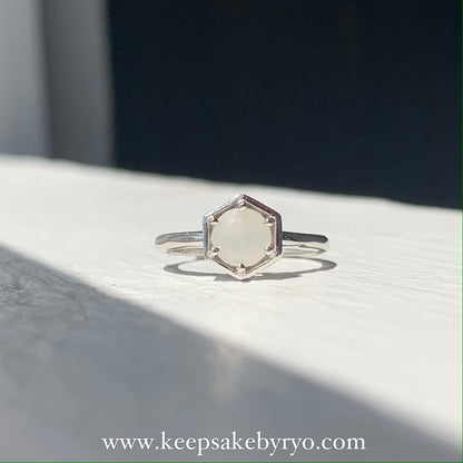 SOLITAIRE: HEXI RING WITH ROUND INCLUSION STONE