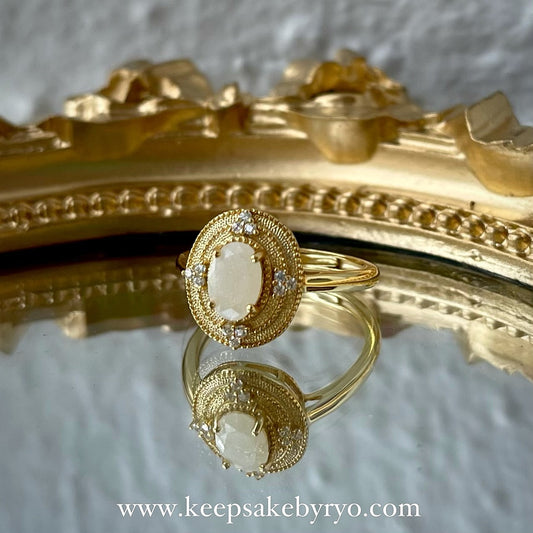 满月金 FULL MONTH GOLD & 百日金 100 DAYS GOLD: DAPHNE RING WITH OVAL INCLUSION STONE